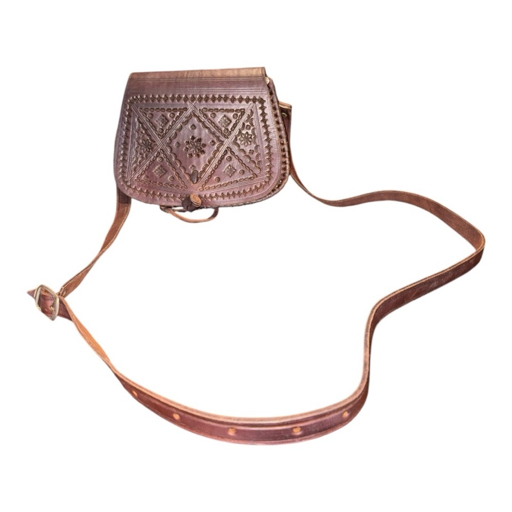 Handcrafted and tooled leather mini saddle crossbody bag. Solid leather TT